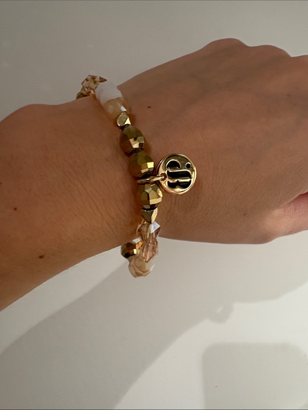 Gold-Tone Faceted Bead Stretch Bracelet with Round Logo Disk - Women's Jewelry